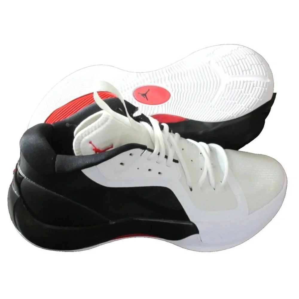 Jordan White and Black Low-Top Athletic Sneakers with Red Logo